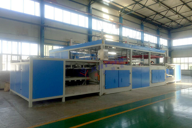 雙頭自動(dòng)<a href=http://www.kkued.com/ target=_blank class=infotextkey>吸塑機(jī)</a>.jpg